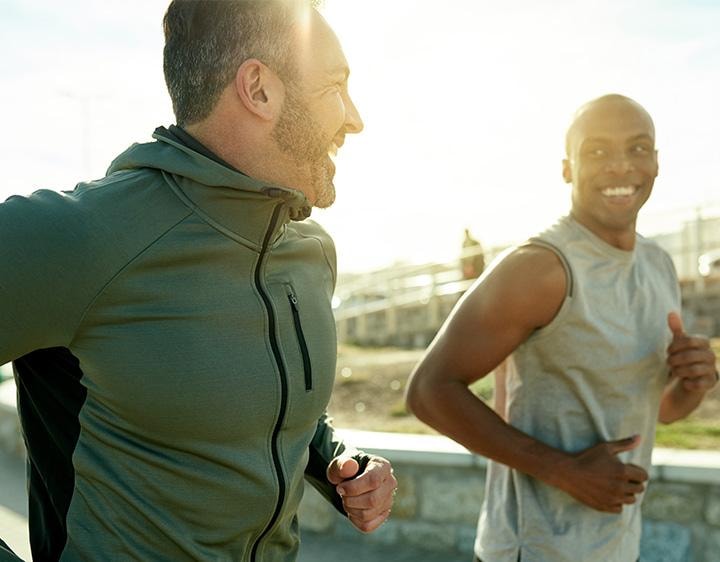 Two men jogging outdoors